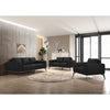 Lifestyle shot featuring a full Kreska leather sofa set in black in a modern living room.