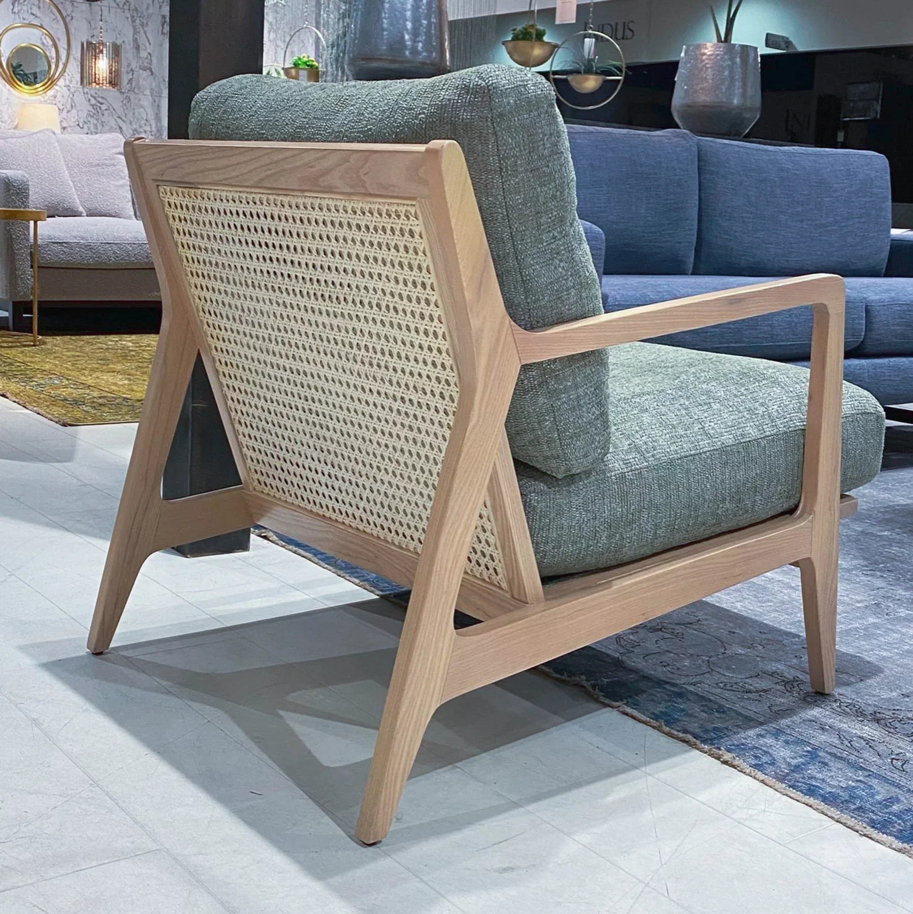 Direct back view of the heather grey Lawrence chair variant
