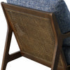 Close-up of the signature cane back detail on the blue Lawrence chair