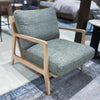 The grey Lawrence chair styled in a modern industrial setting