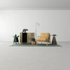 Wide shot of the yellow Lawrence chair in a luxury lounge setting