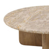 Close-up shot focusing on the organic veining of the circular marble tabletop and the smooth finish of the wood pedestal