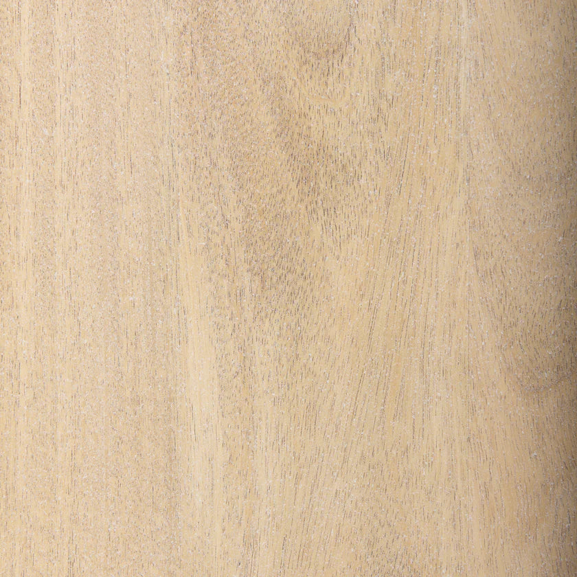 Three-quarter perspective view of the Traro shelving unit in blonde wood featuring a unique geometric honeycomb compartment design