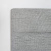 Alternate macro view highlighting the subtle tonal variations in the woven fabric for the Julia bed collection
