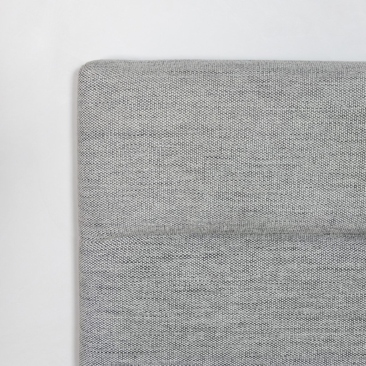 Front view of the Julia storage bed featuring a soft sand fabric and a modern horizontal channel tufted headboard