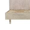 Detailed view of the bed frame corner highlighting the seamless wood joinery and the integrated slat support system