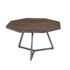 Perspective shot of the larger octagonal coffee table showcasing the dark wood grain and the architectural metal base