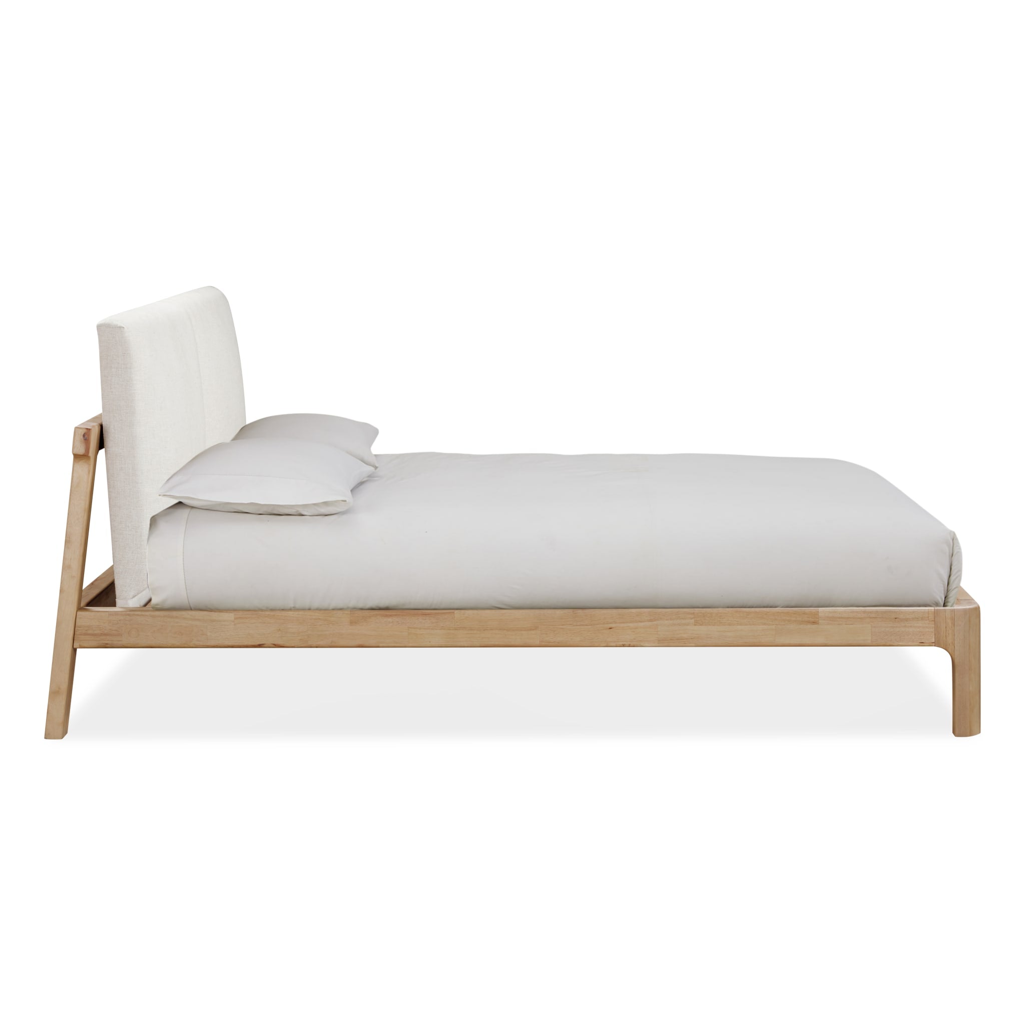 Front view of the Havn platform bed featuring a ginger-finished ash wood frame and a two-cushion natural linen headboard