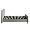 Side profile view showcasing the slender depth of the cushioned headboard and the consistent rounded frame aesthetic