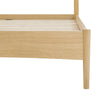Detailed view of the footboard highlighting the soft curved corners and sturdy wood construction
