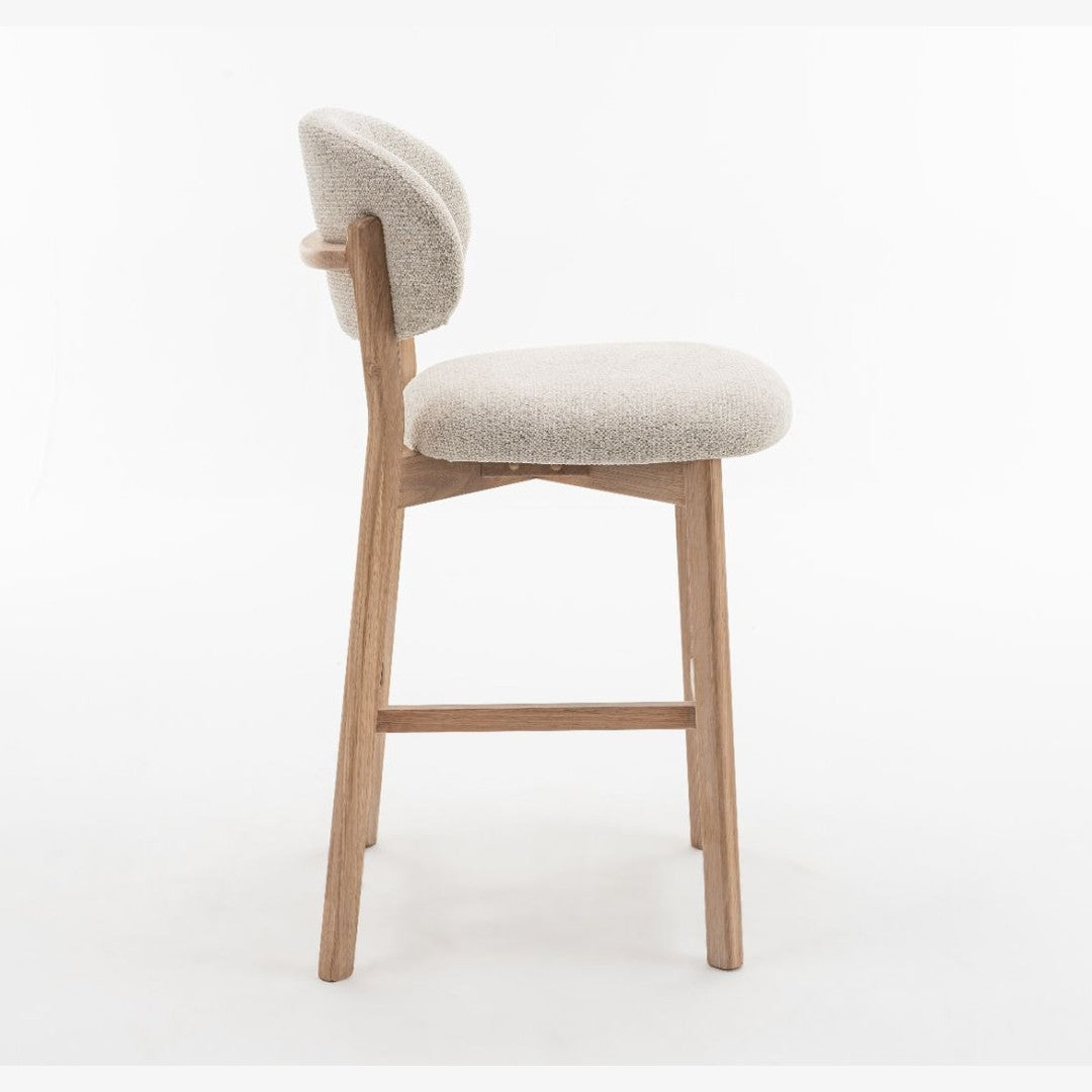 Luna counter stool with beige textured upholstery and natural oak wood frame