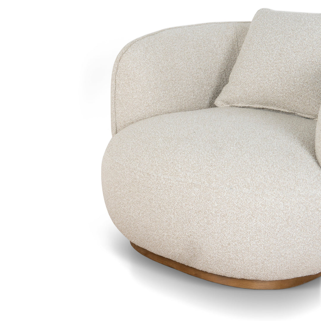 Elevated view focusing on the deep cushioning and the integrated lumbar support pillow