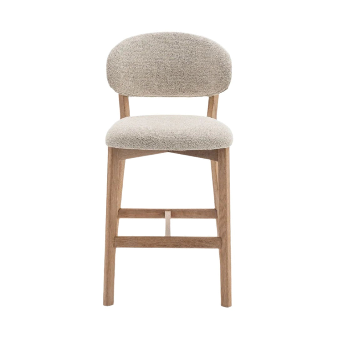 Luna counter stool with beige textured upholstery and natural oak wood frame