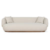 Luna Premium Boucle Sofa with two pillows in cream boucle fabric with curved modern silhouette and wooden base
