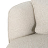 Close-up of Luna Premium Boucle Sofa curved armrest and cream boucle upholstery texture with matching pillow