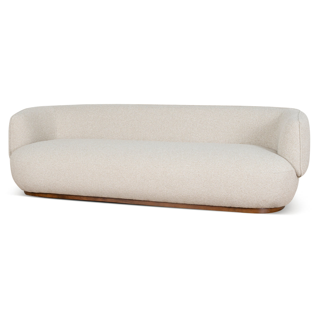 Luna Premium Boucle Sofa in cream boucle fabric with curved backrest and low wooden base, front view modern minimalist sofa