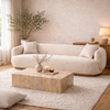 Luna Premium Boucle Sofa in cream boucle fabric styled in a warm modern living room with wood coffee table, rug, and decorative pillows