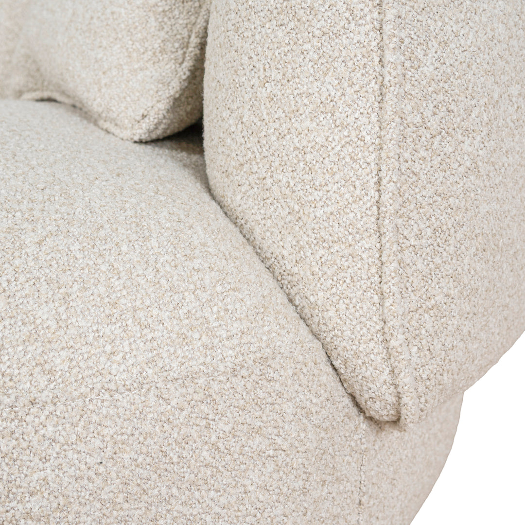 Close-up of Luna Premium Boucle Sofa seat and toss pillow showing soft cream boucle fabric texture