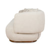 Side view of Luna Premium boucle sofa in cream upholstery with curved armrest and rounded modern silhouette