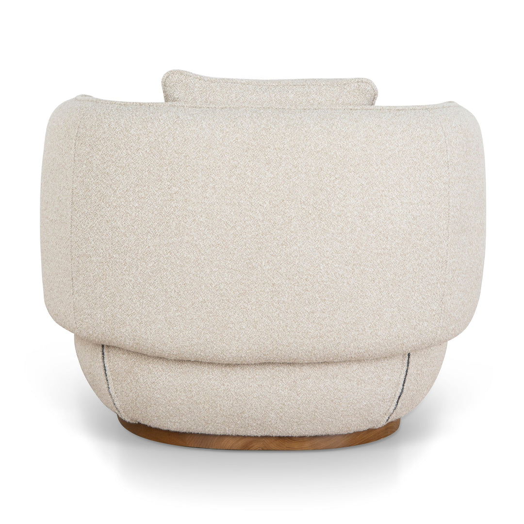 Direct back view demonstrating the clean circular lines and uniform bouclé finish of the upholstered frame