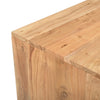 Close-up view focusing on the smooth sanded surface and organic wood grain patterns at the table's edge