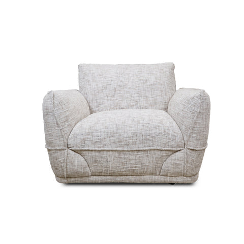 Three-quarter perspective of the Luxe accent chair highlighting the deep seat and thick sculptural armrests