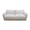 Luxe sofa angled view showcasing plush cushions and soft neutral upholstery