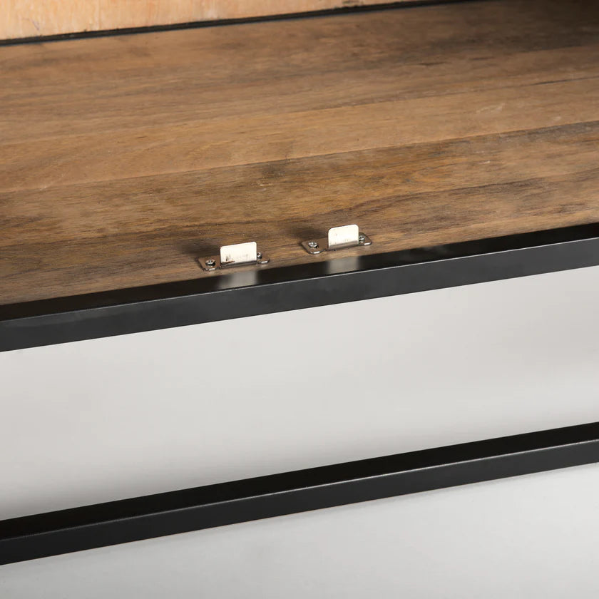 Straight-on front view of the Sloan arch cabinet featuring a matte black finish and natural wood interior shelves