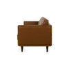 Side profile of Mandalay sofa showing tapered wood legs and leather finish