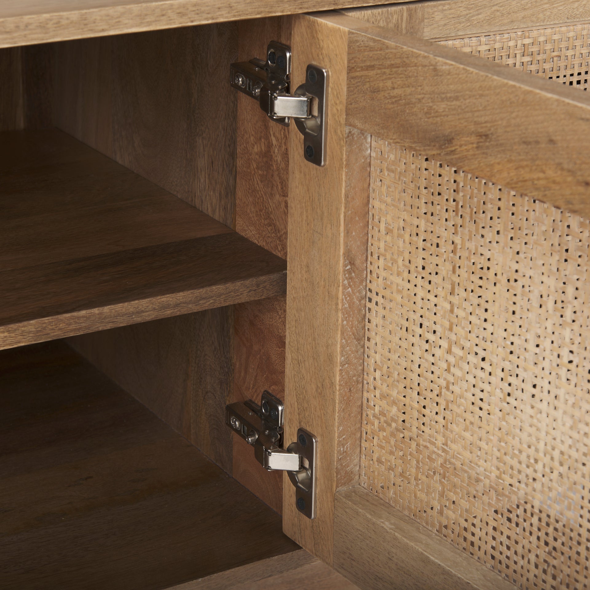 Detailed view of the heavy-duty internal metal hinges and the precise joinery of the internal wood shelving