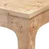 Close-up detail shot focusing on the precision joinery and the smooth finish of the burl wood veneer on the table corner