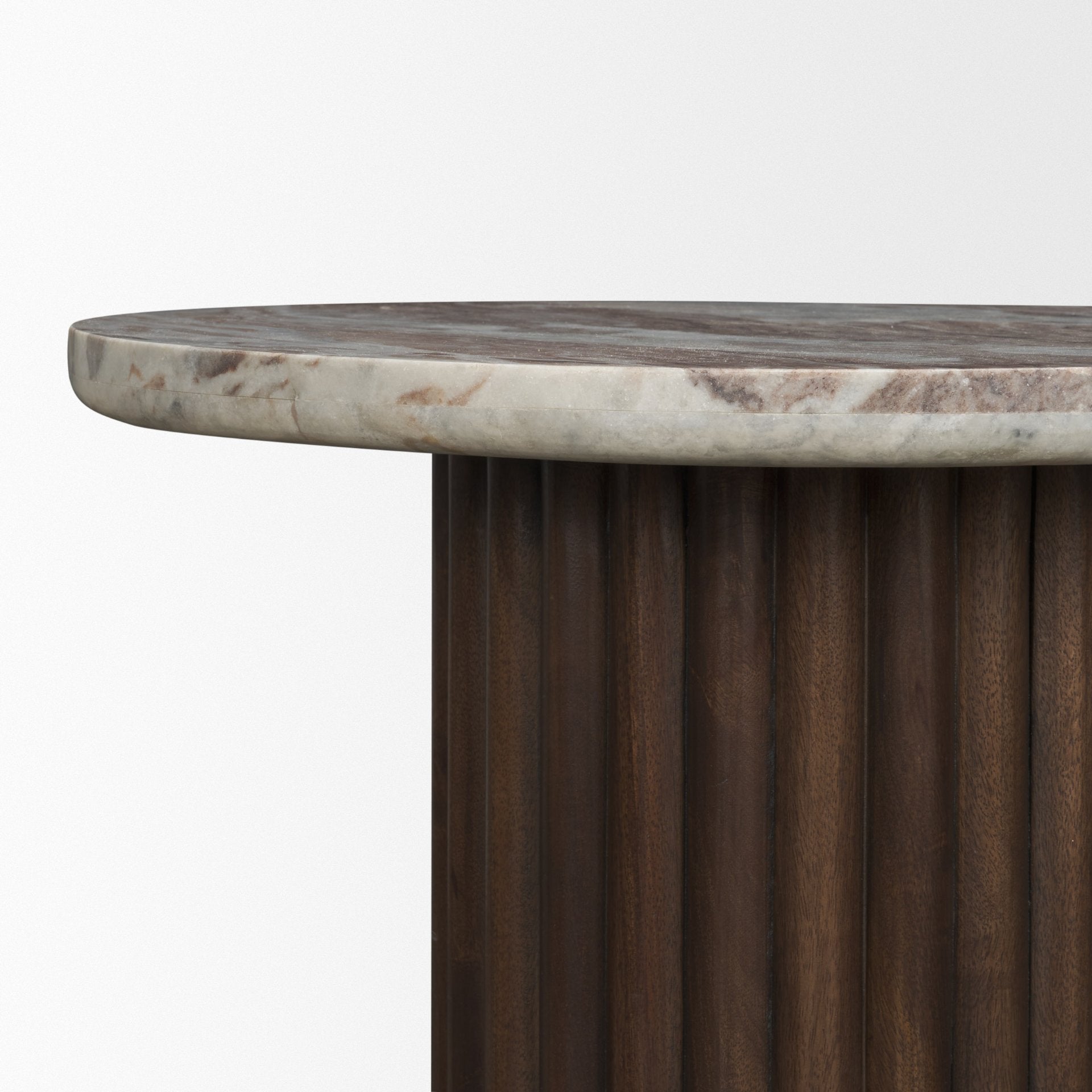 Side profile shot highlighting the slim polished edge of the marble tabletop and the vertical texture of the fluted cylindrical base