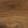 Macro shot showcasing the rich texture and natural brown finish of the circular wooden tabletop
