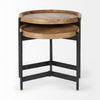 Straight-on profile view highlighting the architectural tripod base and slim black metal legs of the nesting table set