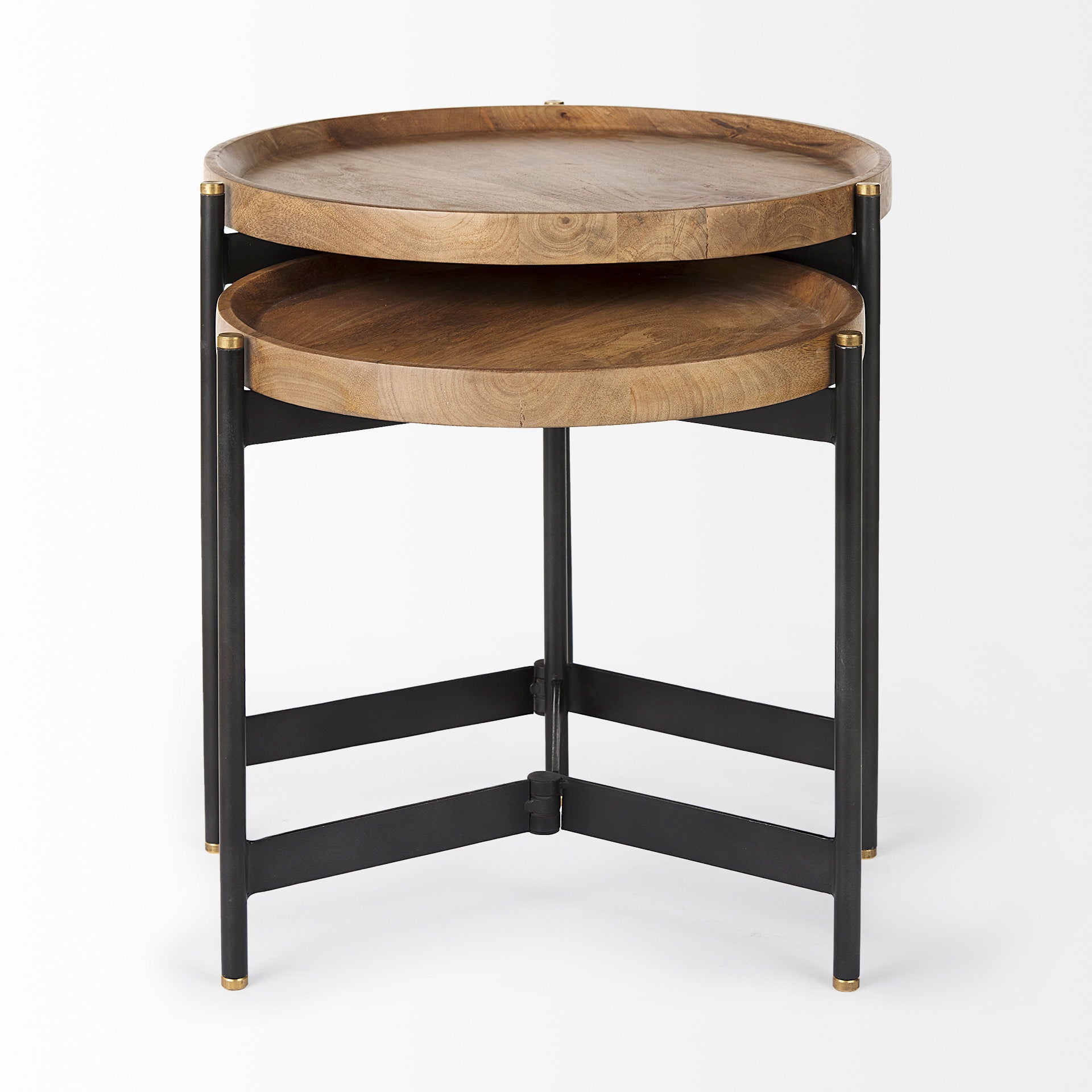 Straight-on profile view highlighting the architectural tripod base and slim black metal legs of the nesting table set