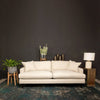 Martha sofa styled against a dark moody accent wall