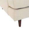 Close-up of dark wood tapered leg on Martha sofa