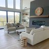 Lifestyle view of Martha sofa in a high-ceiling loft