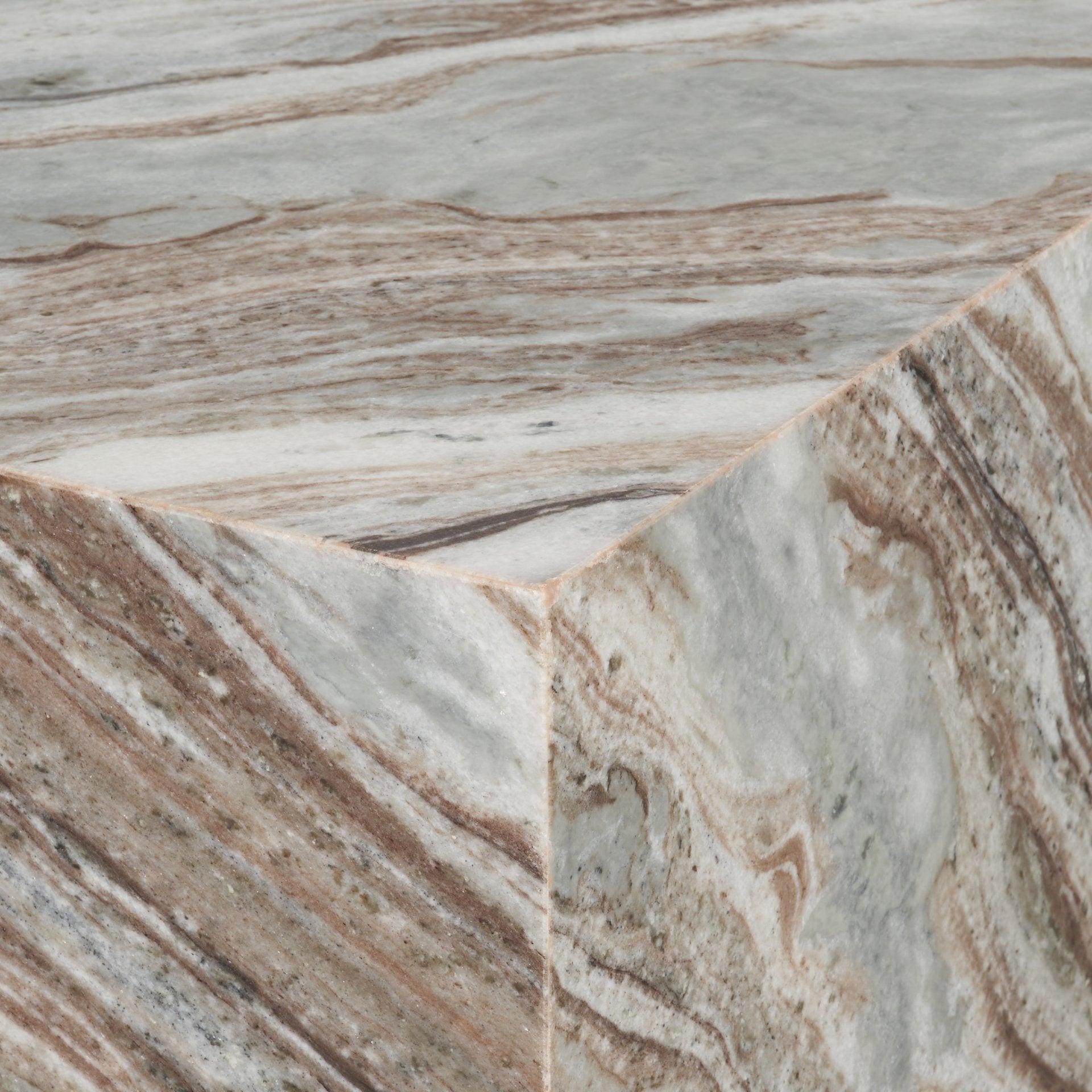 Detailed high-angle view of the mitered corner joinery showcasing the crystalline structure of the pink marble