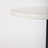 Close up detail of the smooth white marble surface on the Maxwell side table