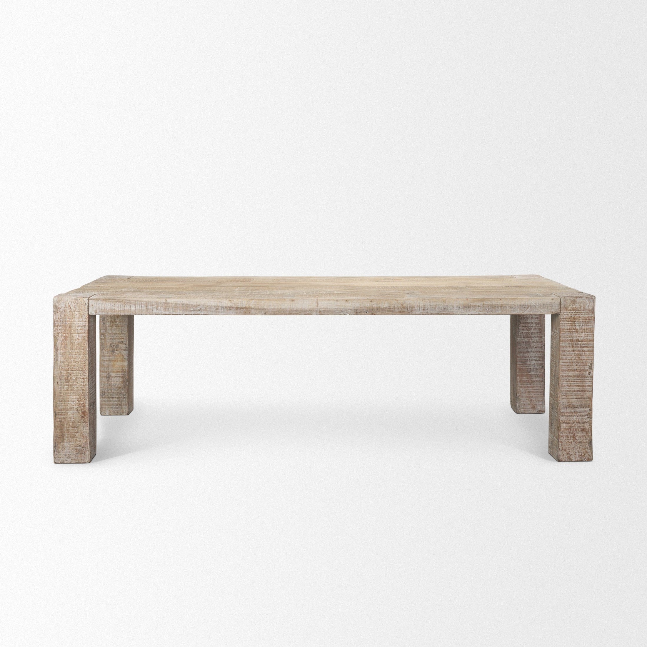 Front view of the 94-inch McArthur dining table featuring a whitewash finish and a substantial Parsons-style reclaimed wood construction