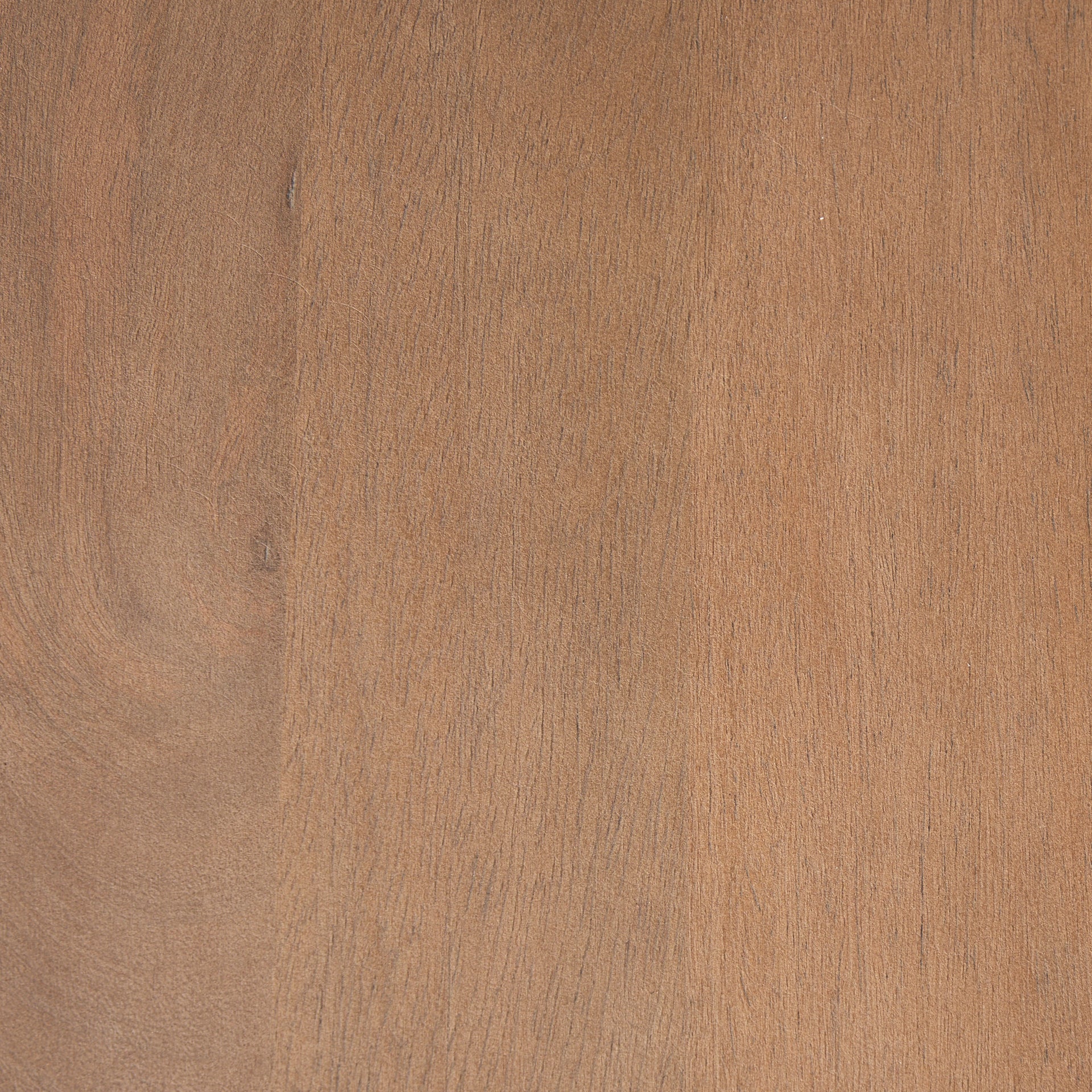 Macro texture shot showcasing the organic wood grain and smooth matte finish of the medium brown solid wood