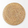 Direct overhead view showcasing the circular flat top and the radiating spiral weave pattern of the natural seagrass