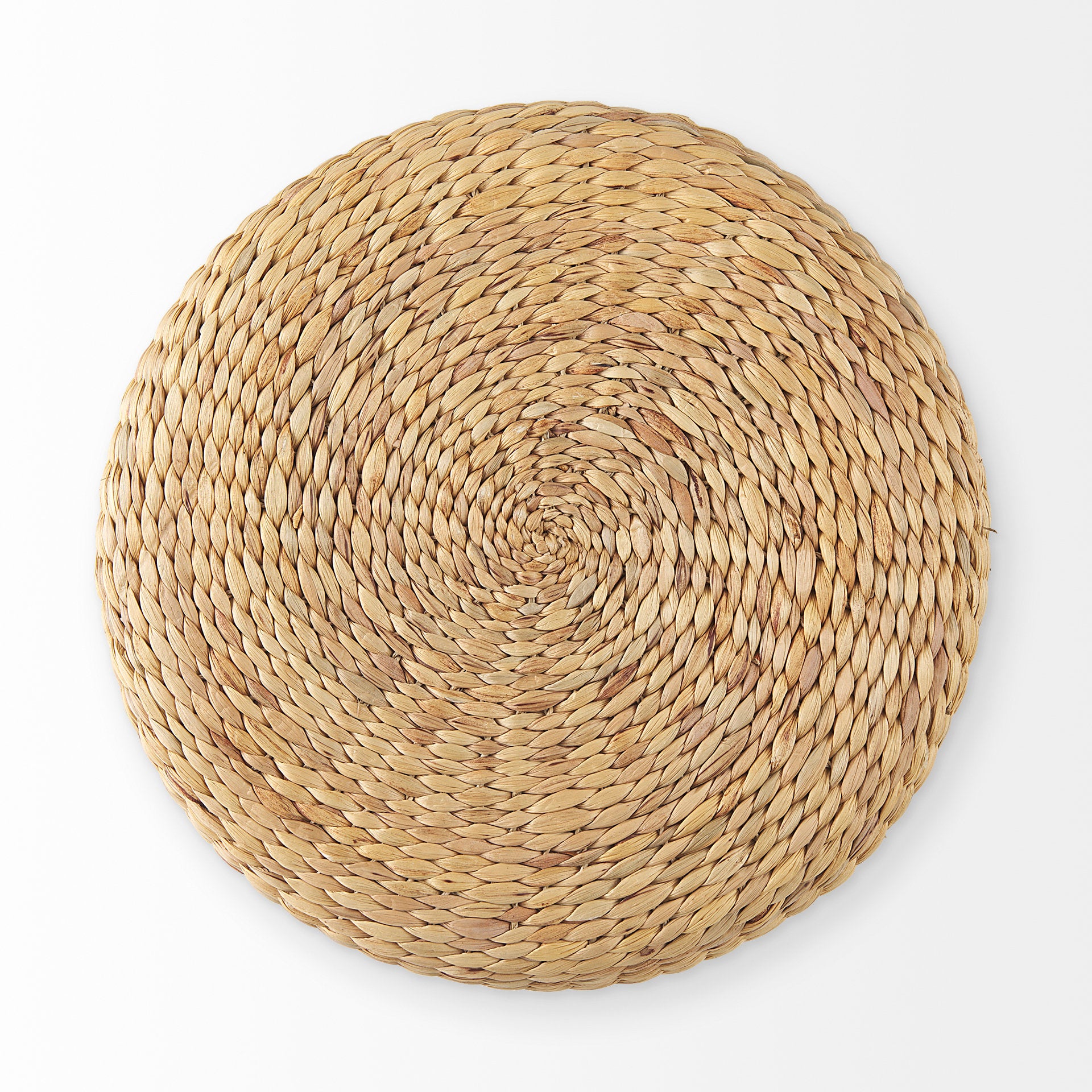 Front three-quarter view of the Michelle round pouf featuring a decorative checkered woven seagrass design in light brown