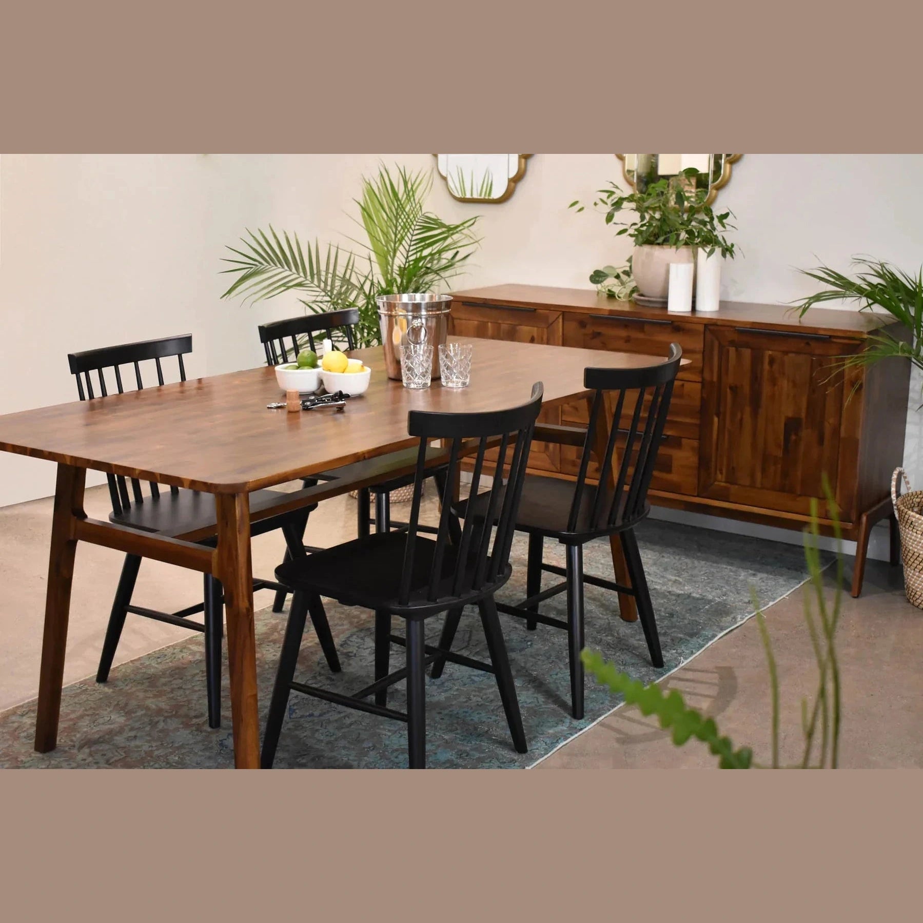 Front view of the Remix dining table in a rich walnut-toned acacia wood featuring a minimalist rectangular top and flared tapered legs