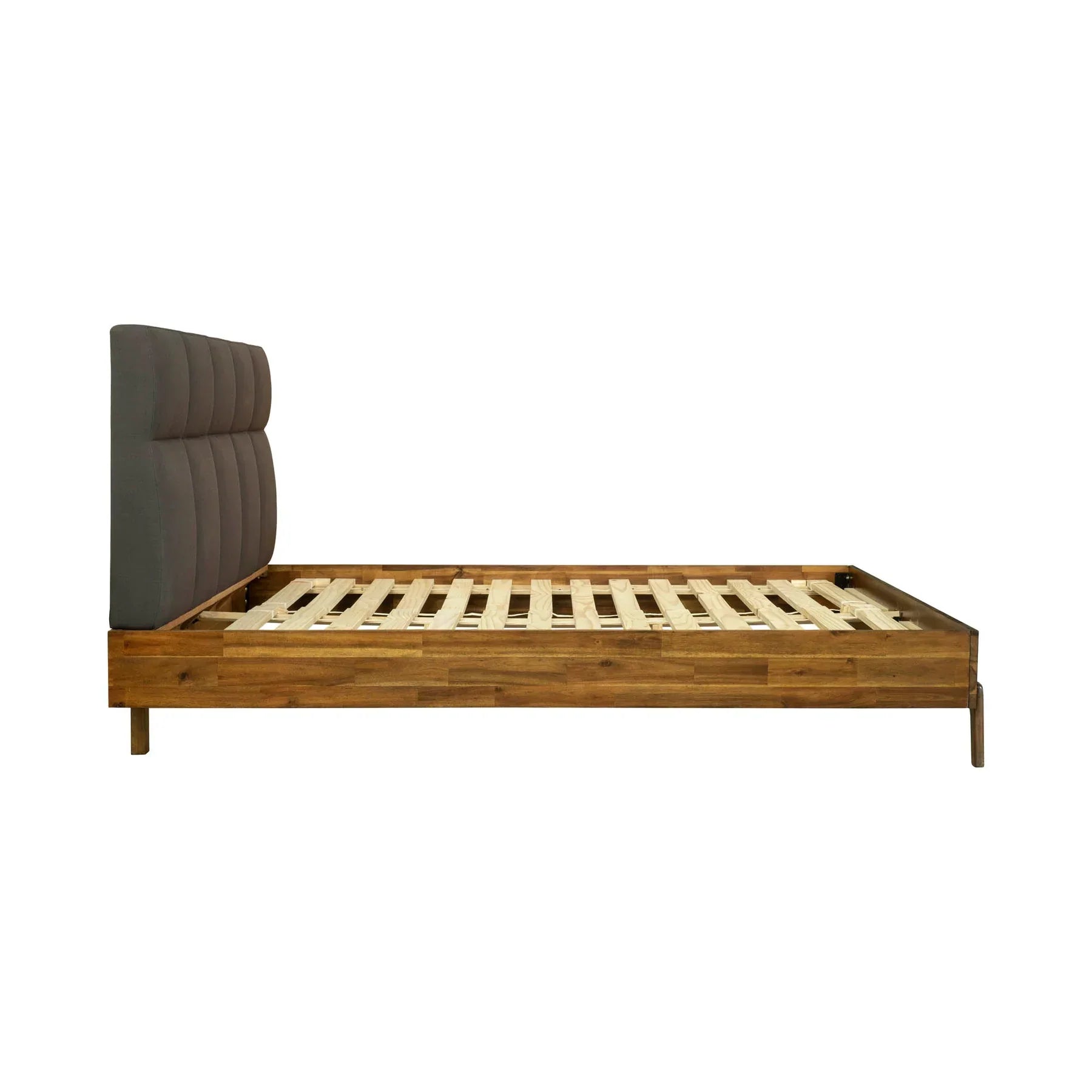 Side profile view showcasing the slim tapered wood legs and the secure attachment of the cushioned grey headboard