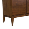 Macro shot focusing on the elegant tapered leg design and the seamless connection to the sideboard frame