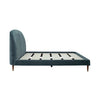 Side profile view showcasing the soft architectural curve of the headboard and the low-profile platform design