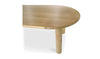 Close-up shot focusing on the authentic natural wood grain texture and smooth finish of the oval oak tabletop
