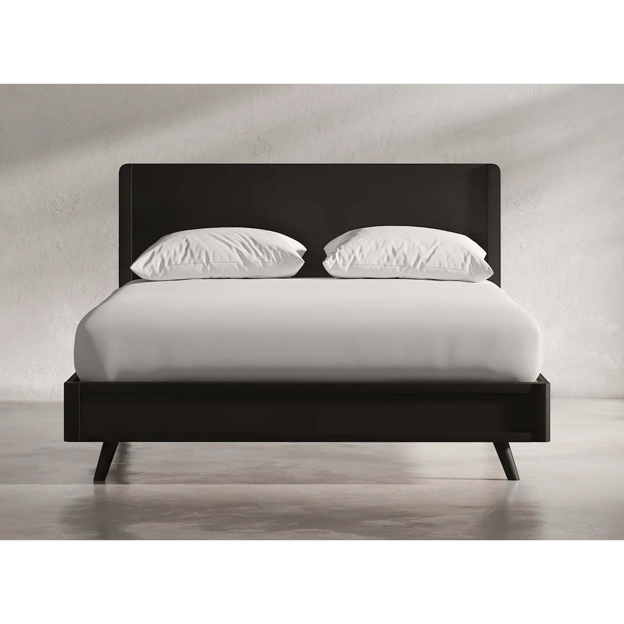 Clean studio shot of the Marlowe bed with white pillows showcasing the low-profile headboard design
